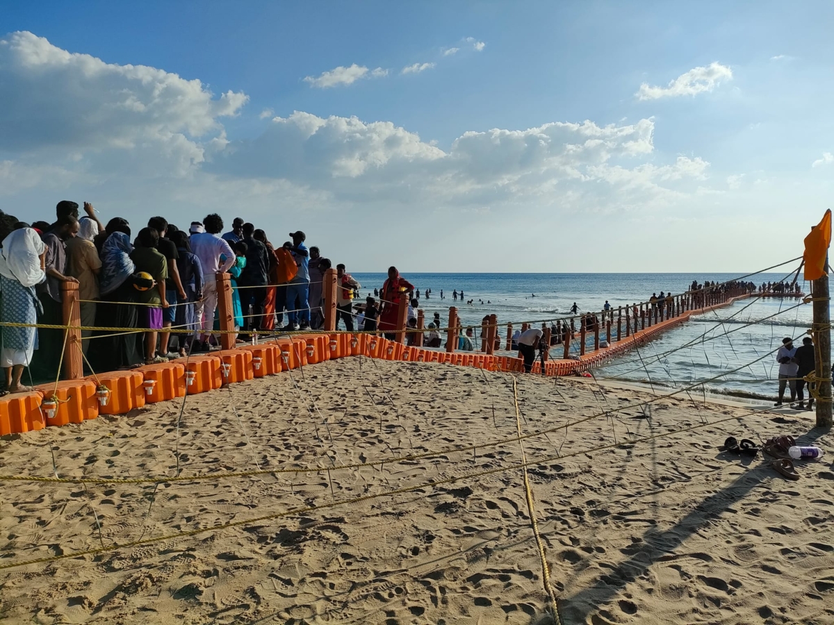 Enthusiastic Crowds Flock to Experience the Newly Inaugurated Floating Bridge at Papanasam Beach Amidst Christmas Holiday Celebrations.