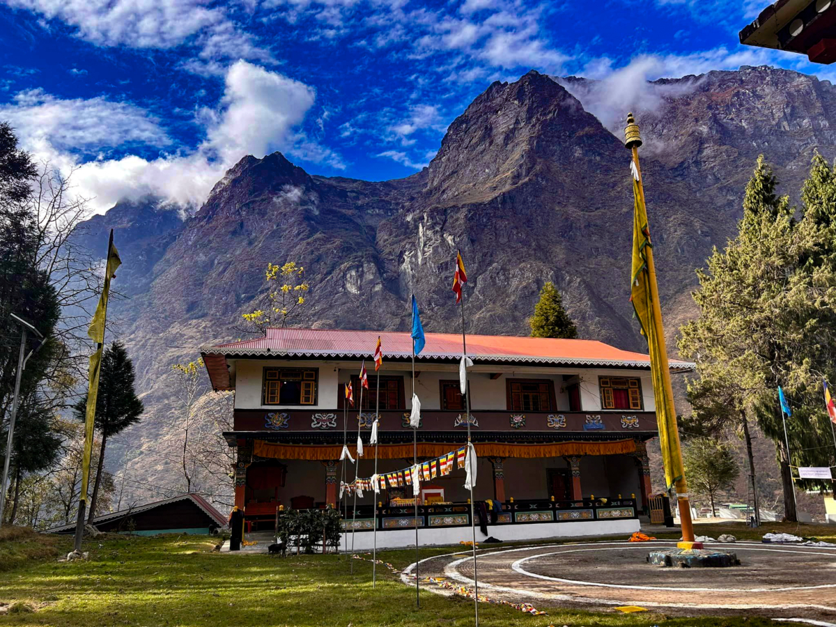 Lachung Monastery in December with Rocky Mountain Tops surrounding the Lachung Valley in the Background.