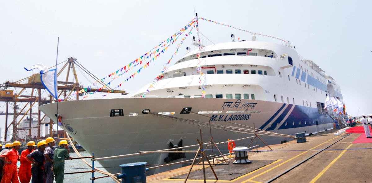 Lakshwadeep Travel Guide: Getting into and Transportation between the islands. A picture of a vessel harboured at the Kavaratti Port has been given.