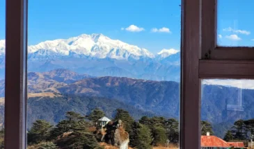 View of Snow Clad Khangchendzonga from the hotel in SetMyTrip's Sandakphu Tour Package