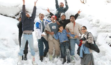 Family Enjoying Snow at Katao Pass: Sikkim Snow Packages