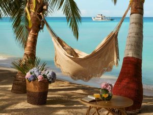 SetMyTrip’s 6 Nights 7 Days Lakshadweep Island Hopping Package for foreign nationals includes 3 nights at Kavaratti Beach Resort and 3 nights at IHCL Bangaram Island Resort or Bangaram IHCL Coral Pearl Resort, featuring idyllic beach escapes with hammocks, turquoise waters, and palm-shaded relaxation.