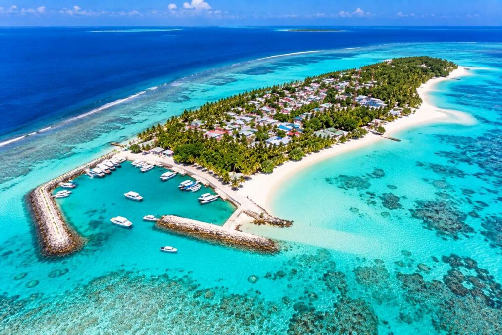 Aerial view of Fulidhoo Island Maldives with village, harbour, white beaches and turquoise lagoon