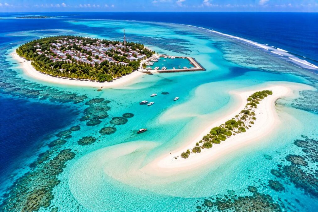 Aerial view of Mathiveri Island Maldives with Mathiveri Finolhu sandbank and turquoise lagoon